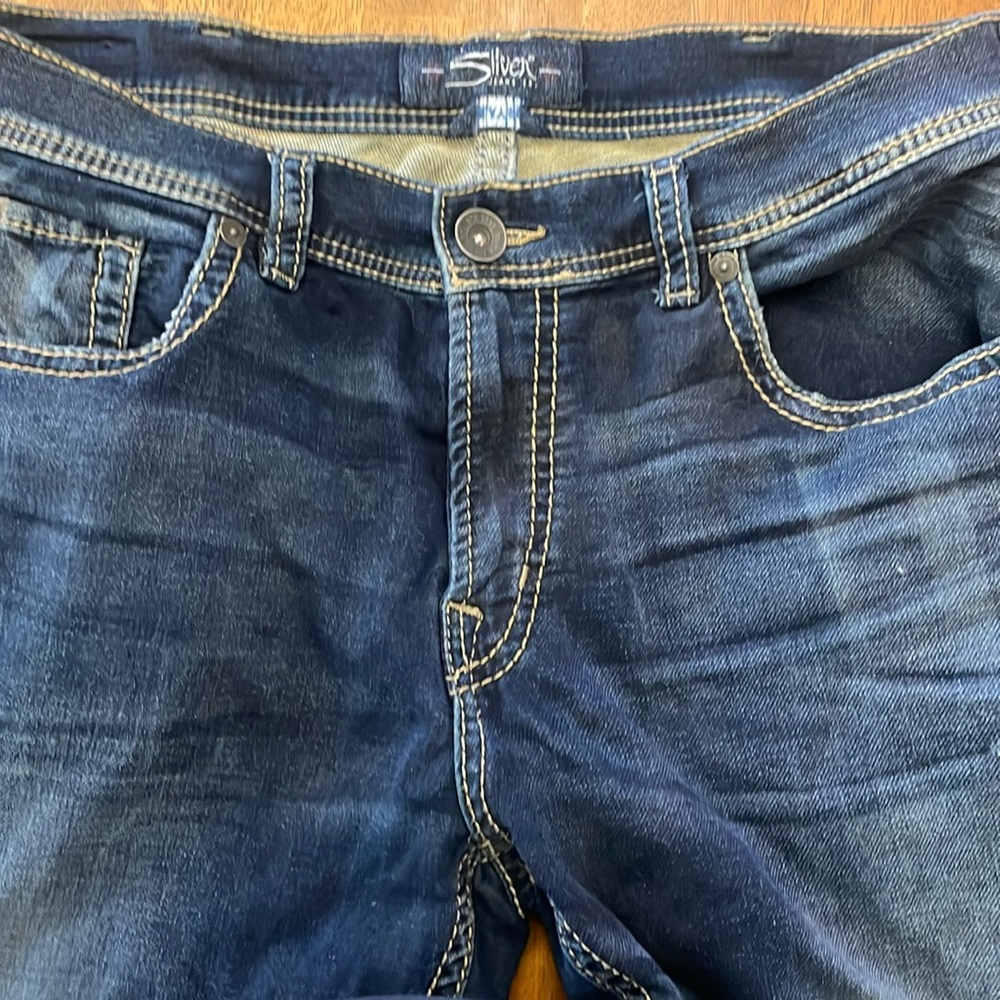 Men’s silver jeans.